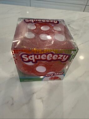 Brand new pink squeeezy dice